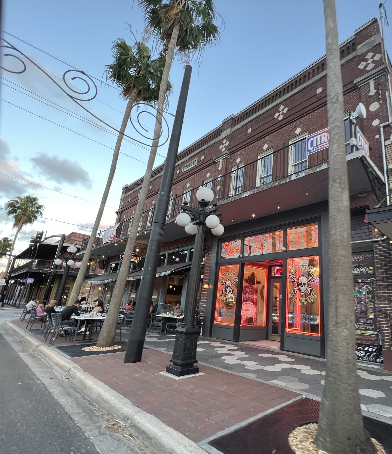 7th Avenue street view in Ybor City with palm trees