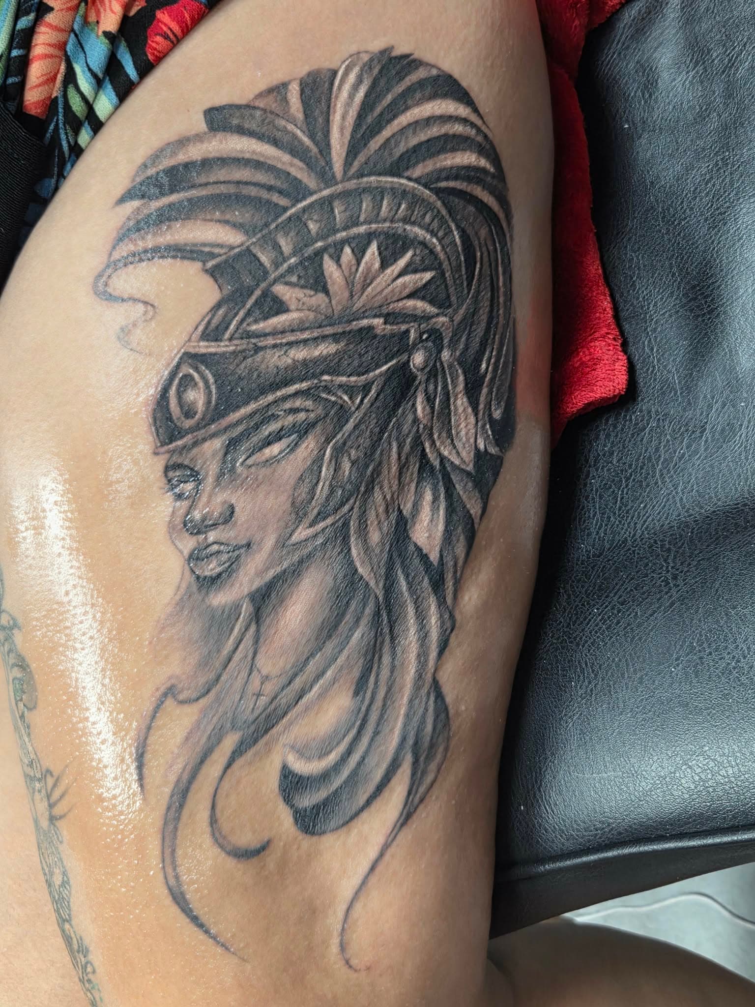 Black and grey warrior woman thigh piece