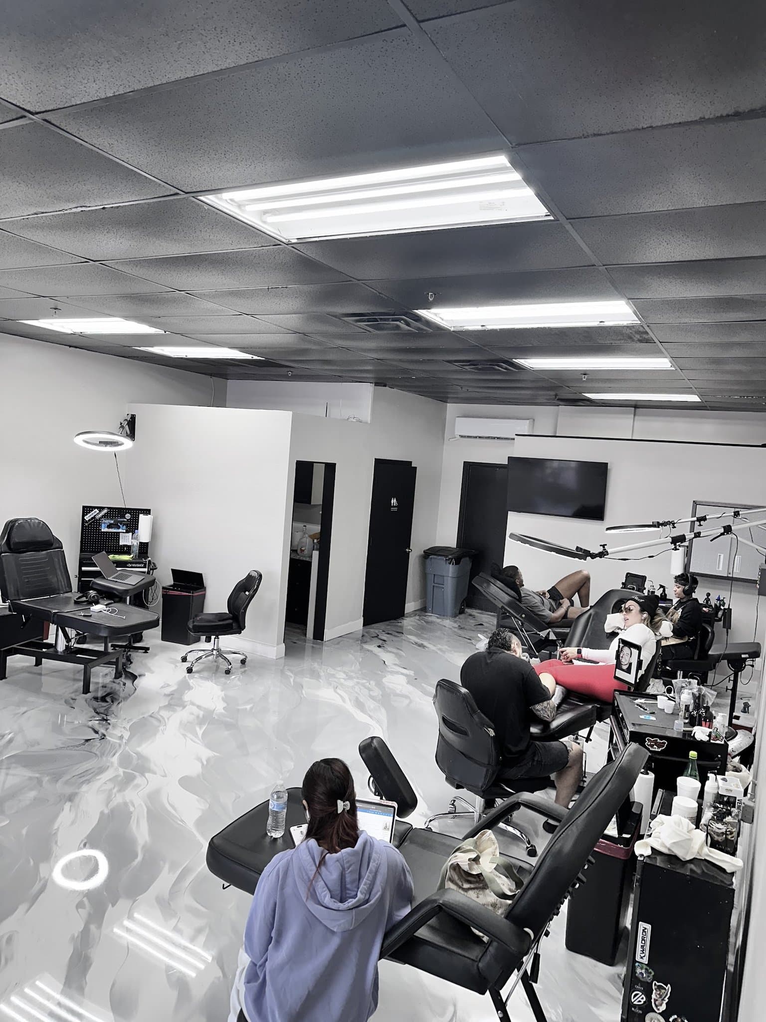 The Forever Ink studio floor mid-session