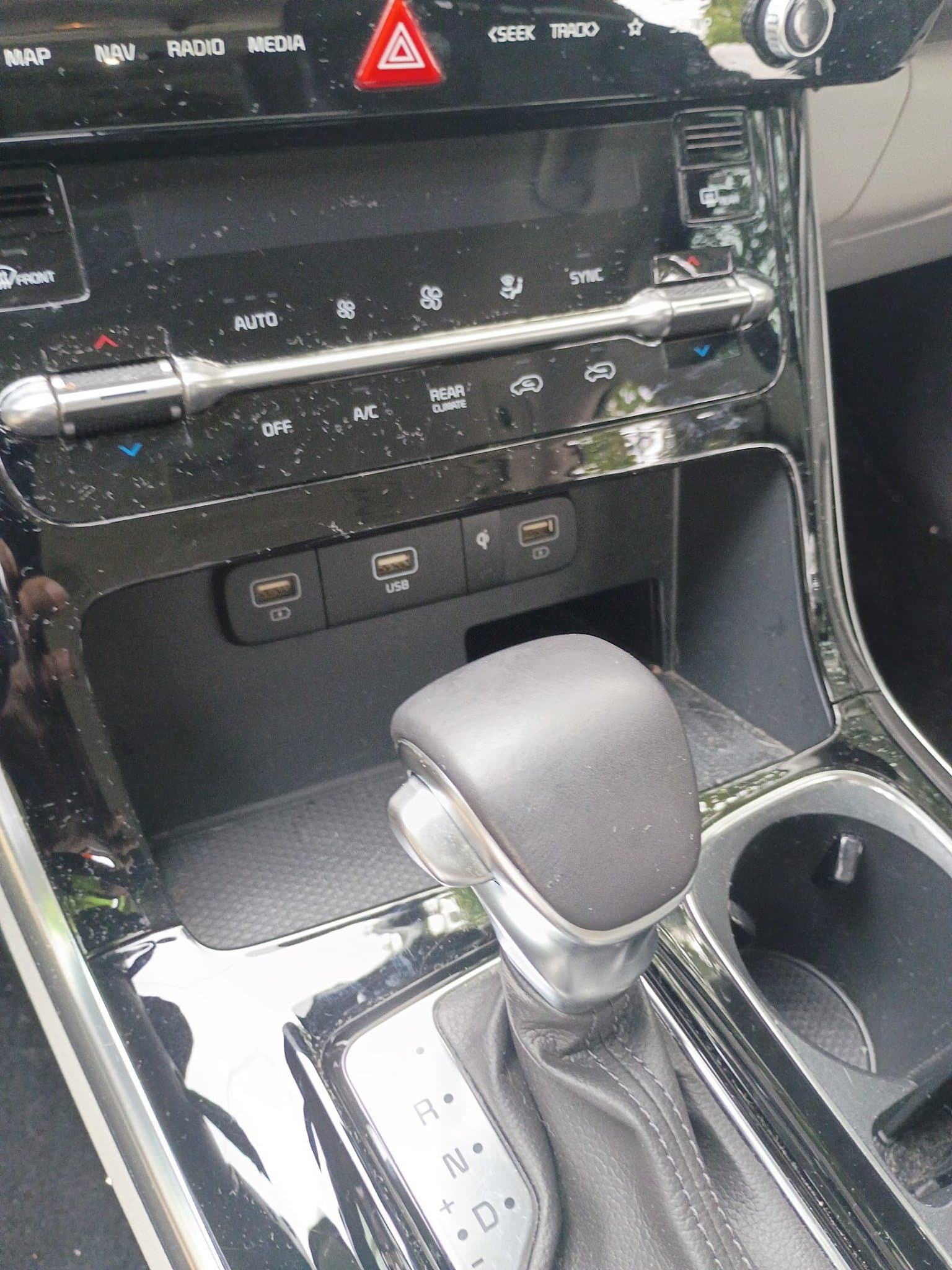Detailed center console and dash after a full interior detail