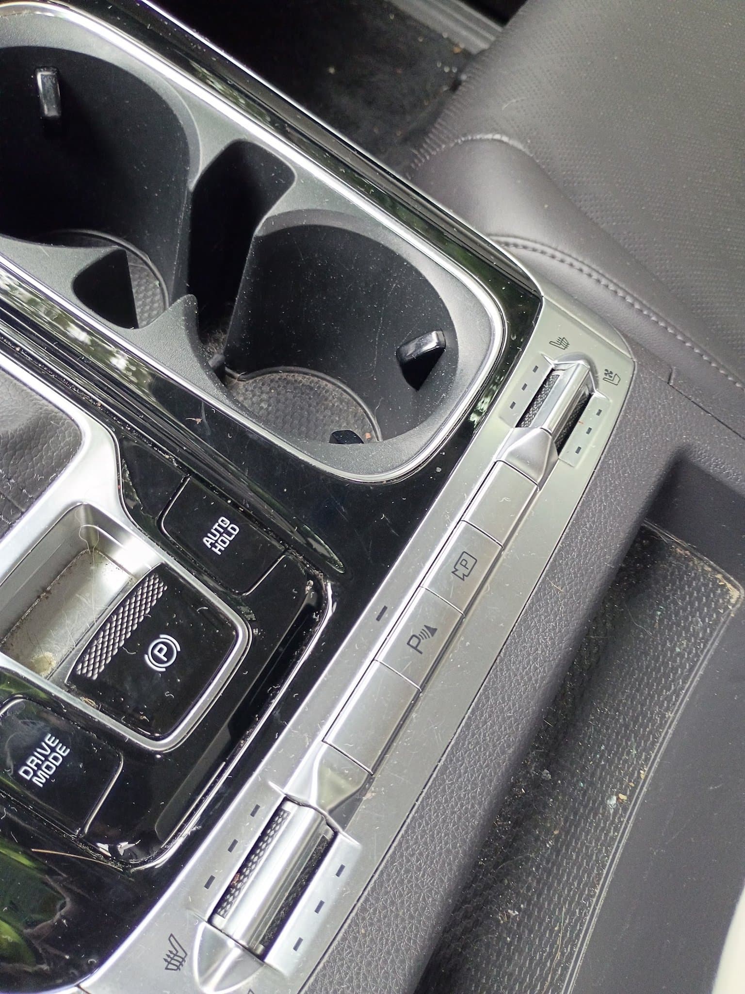 Spotless cupholders and center console after detailing