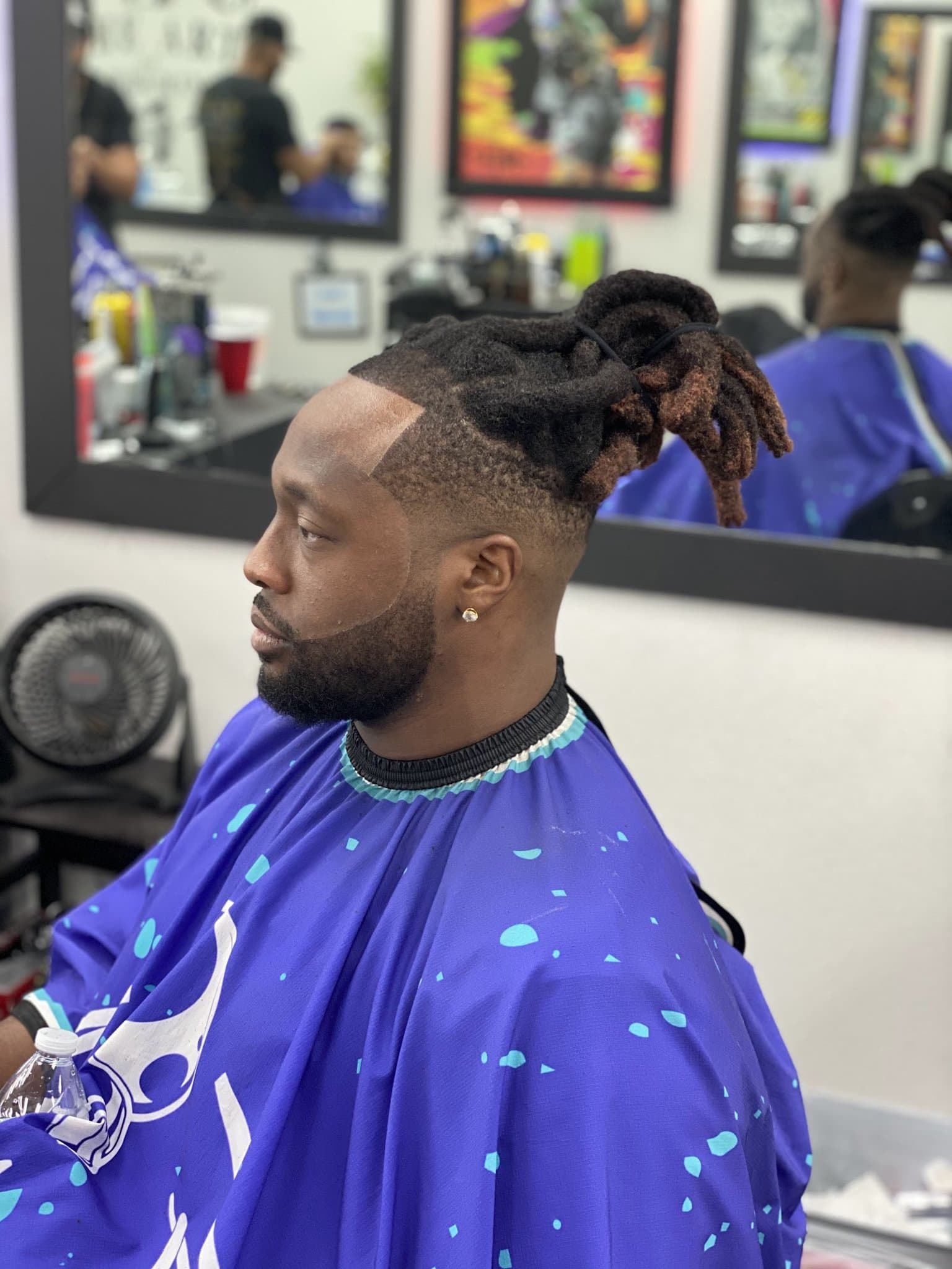 Fresh taper and beard lineup on a client at Razorz Edge
